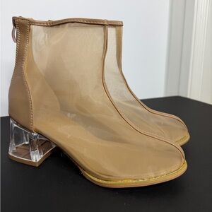 Stylish Tan Heeled Boots with Transparent Design